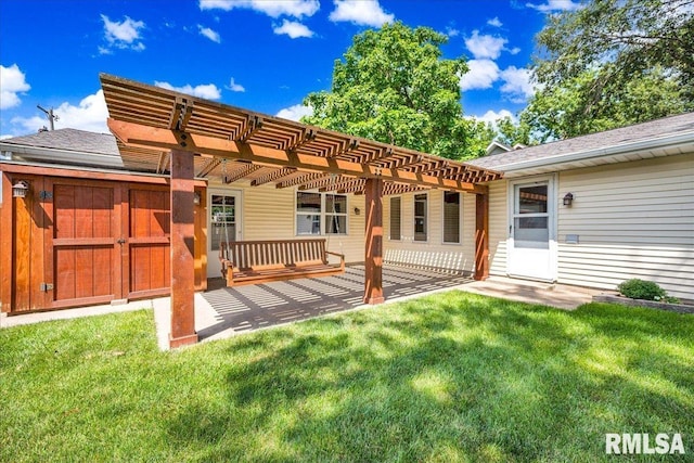 303 W 3rd Ave, Deer Creek, IL 61733 - back of house featuring a yard, a patio area, a pergola, and a shingled roof