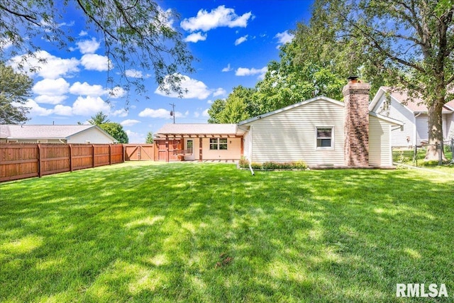303 W 3rd Ave, Deer Creek, IL 61733 - rear view of property with a fenced backyard