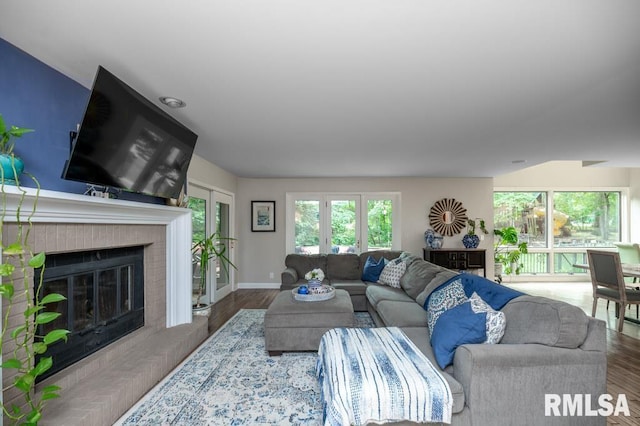408 W Ravinwoods Rd, Peoria, IL 61615 - living room with a fireplace and wood finished floors