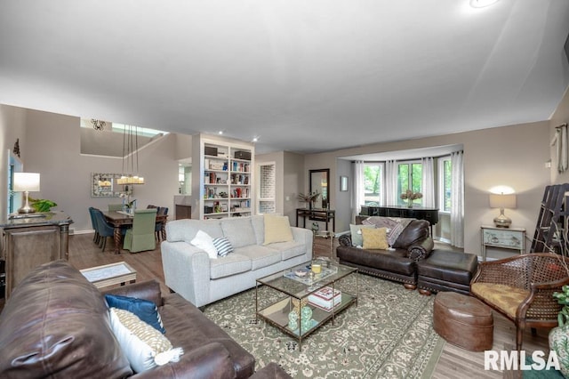 408 W Ravinwoods Rd, Peoria, IL 61615 - living area featuring wood finished floors and recessed lighting
