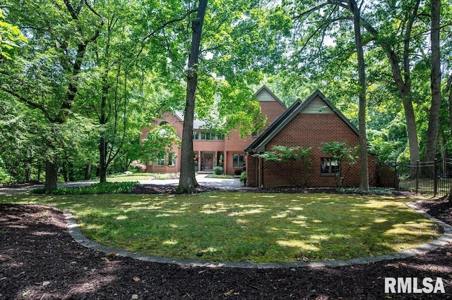 408 W Ravinwoods Rd, Peoria, IL 61615 - view of side of home featuring brick siding