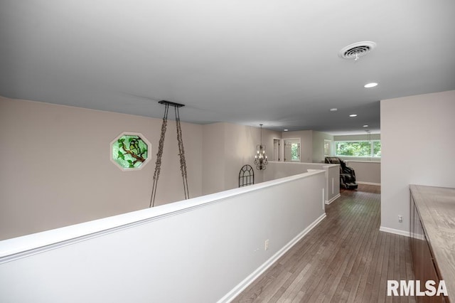 408 W Ravinwoods Rd, Peoria, IL 61615 - corridor featuring wood-type flooring and recessed lighting