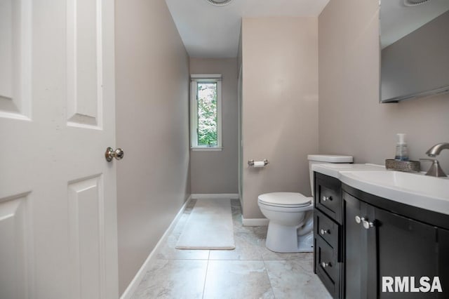 408 W Ravinwoods Rd, Peoria, IL 61615 - bathroom with vanity and baseboards