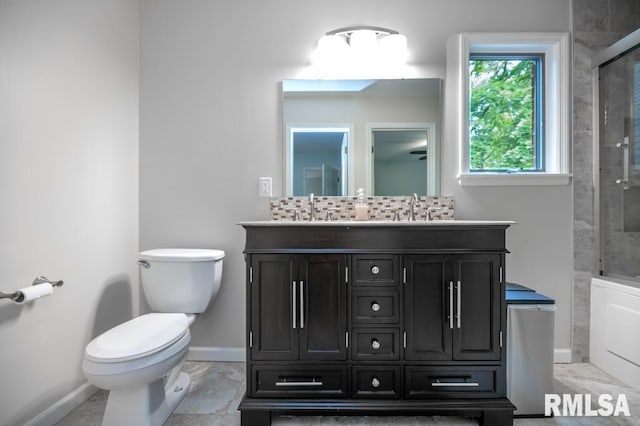 408 W Ravinwoods Rd, Peoria, IL 61615 - bathroom featuring vanity and a shower with door