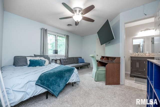 408 W Ravinwoods Rd, Peoria, IL 61615 - bedroom featuring light colored carpet, ceiling fan, and ensuite bath