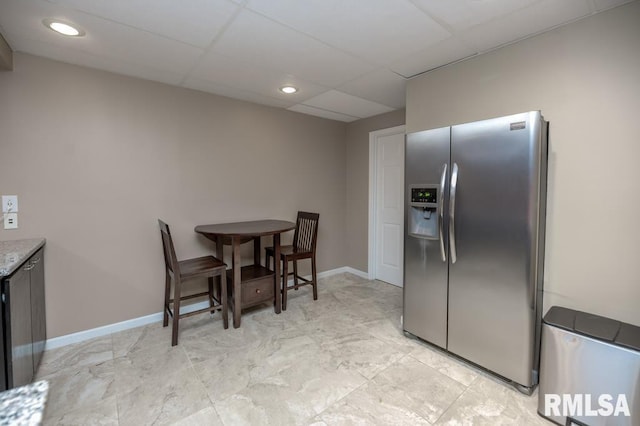 408 W Ravinwoods Rd, Peoria, IL 61615 - kitchen with stainless steel fridge with ice dispenser, a drop ceiling, and recessed lighting
