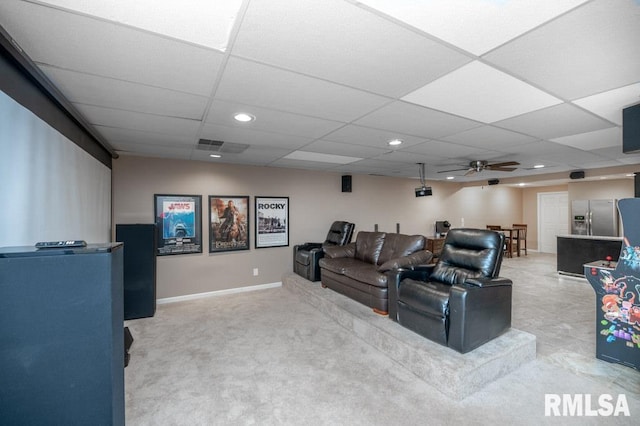 408 W Ravinwoods Rd, Peoria, IL 61615 - home theater featuring a drop ceiling, carpet, a ceiling fan, and recessed lighting