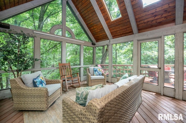 408 W Ravinwoods Rd, Peoria, IL 61615 - sunroom featuring an outdoor hangout area, a skylight, and plenty of natural light