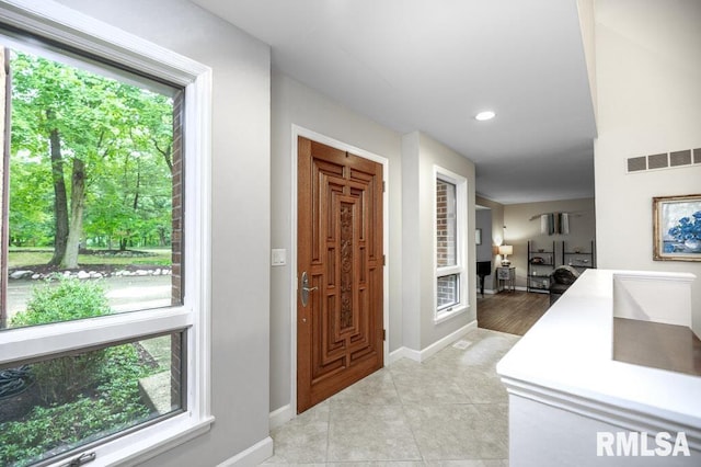 408 W Ravinwoods Rd, Peoria, IL 61615 - entryway featuring plenty of natural light, light tile patterned floors, and recessed lighting