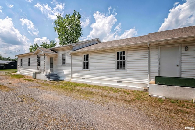 view of front facade featuring central AC unit