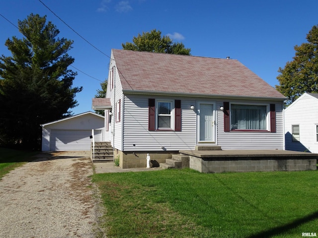 view of front of home featuring a front yard and a garage