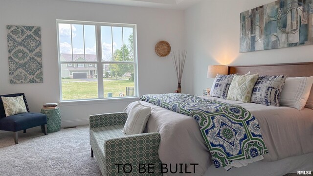 carpeted bedroom featuring visible vents and baseboards