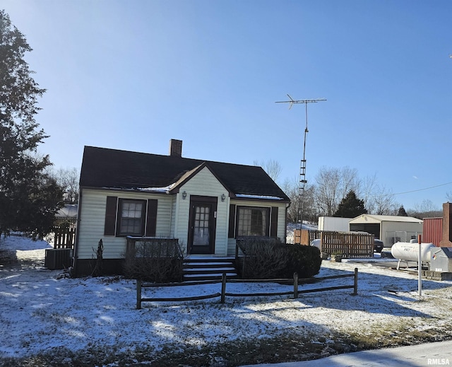 view of front of home featuring central air condition unit