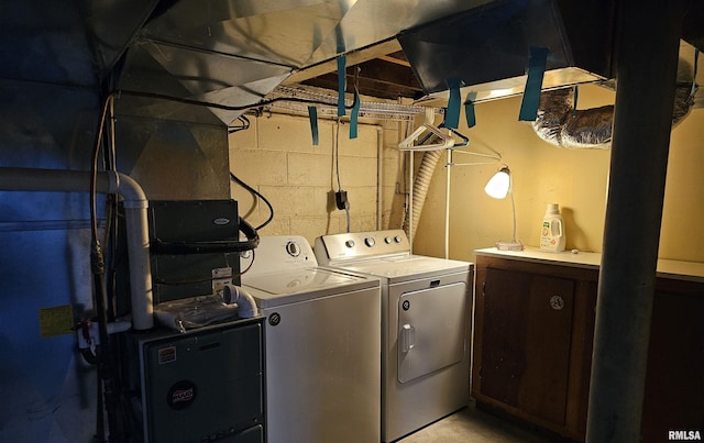 laundry room featuring separate washer and dryer