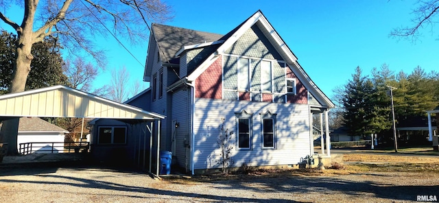 view of property exterior featuring a garage