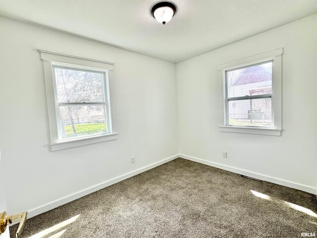 view of carpeted spare room