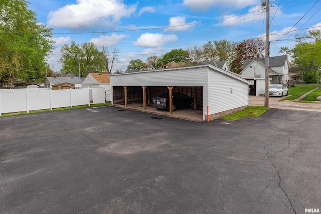 garage with a carport