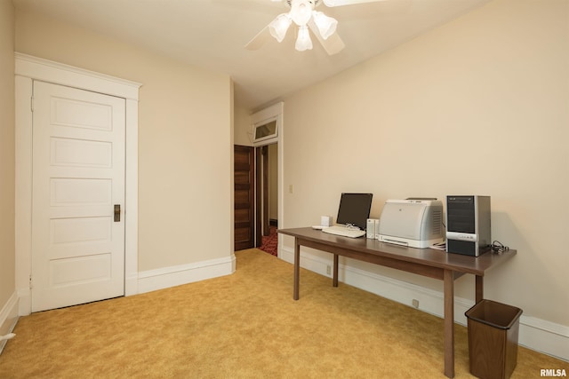 carpeted office with ceiling fan