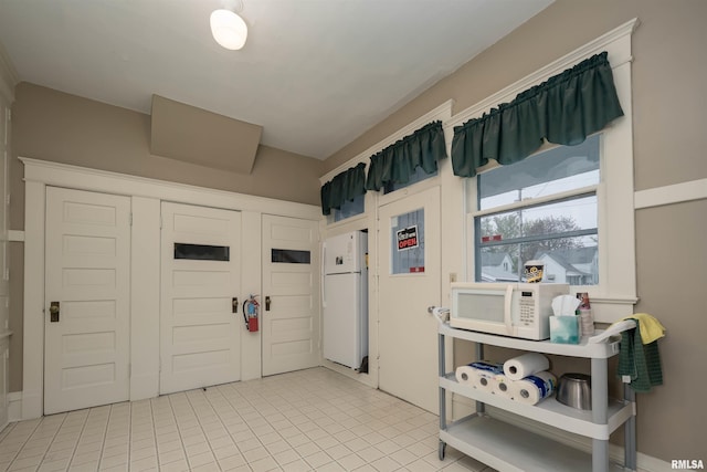 view of tiled entrance foyer