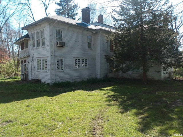 view of property exterior featuring a yard