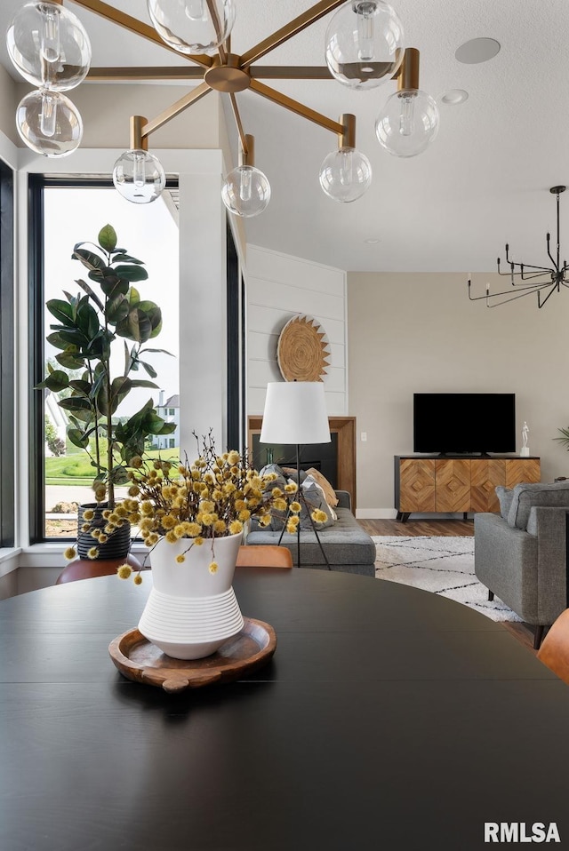 dining area featuring a textured ceiling