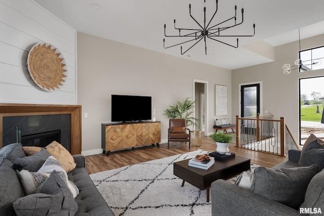 living room featuring hardwood / wood-style floors and a chandelier