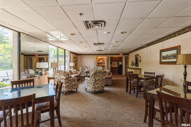 view of carpeted dining space