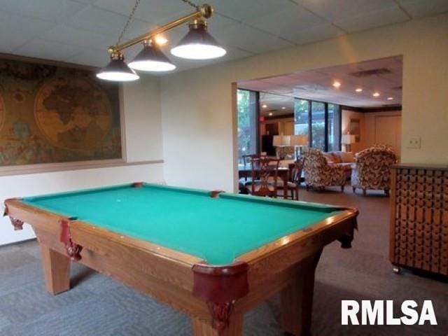 recreation room with a paneled ceiling, carpet, and billiards