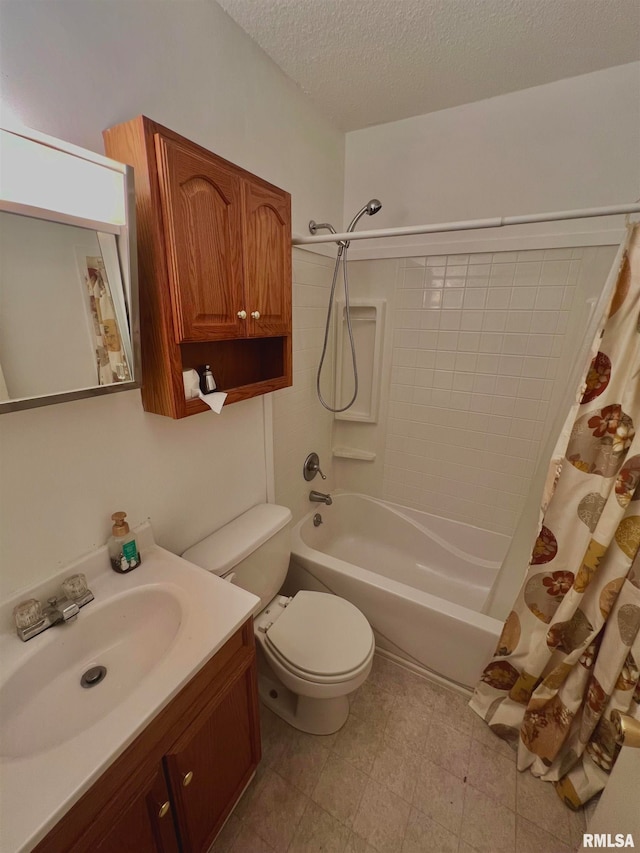 full bathroom with shower / bath combo with shower curtain, tile patterned flooring, a textured ceiling, toilet, and vanity