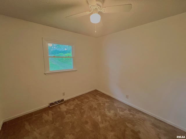 carpeted empty room with ceiling fan