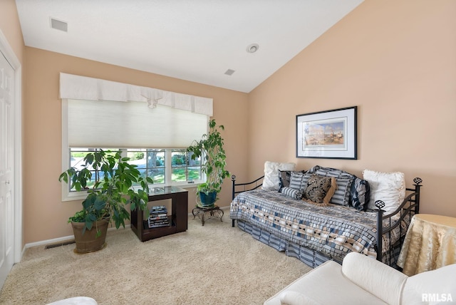 living room with carpet floors and lofted ceiling