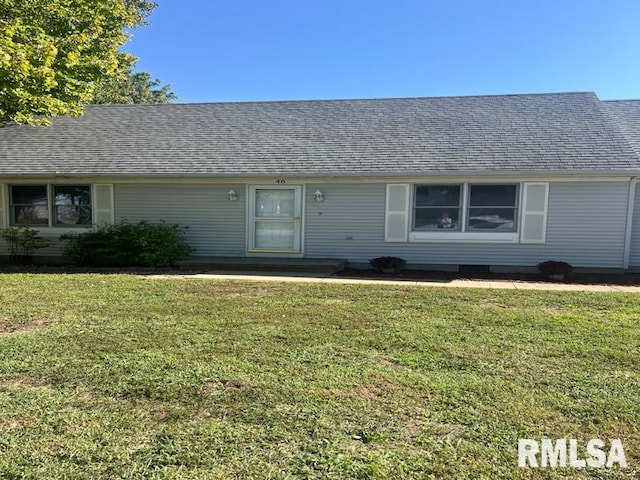 single story home with a front lawn