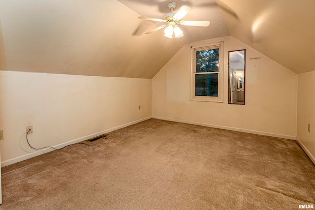 bonus room featuring carpet floors, lofted ceiling, and ceiling fan