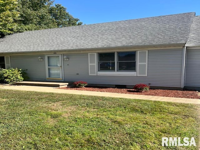 single story home with a front yard