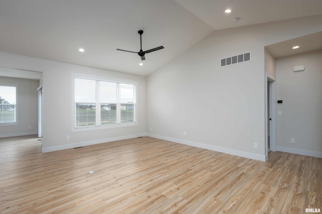 unfurnished room with ceiling fan, light hardwood / wood-style flooring, and high vaulted ceiling