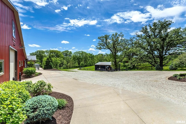 exterior space with concrete driveway