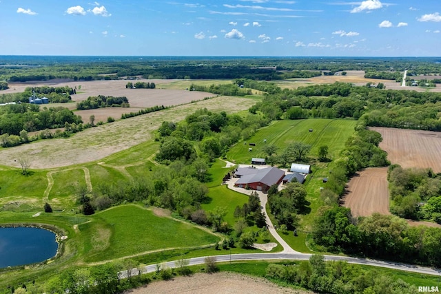 drone / aerial view featuring a water view and a rural view