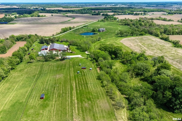 birds eye view of property featuring a rural view