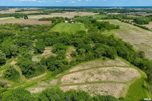 birds eye view of property featuring a rural view