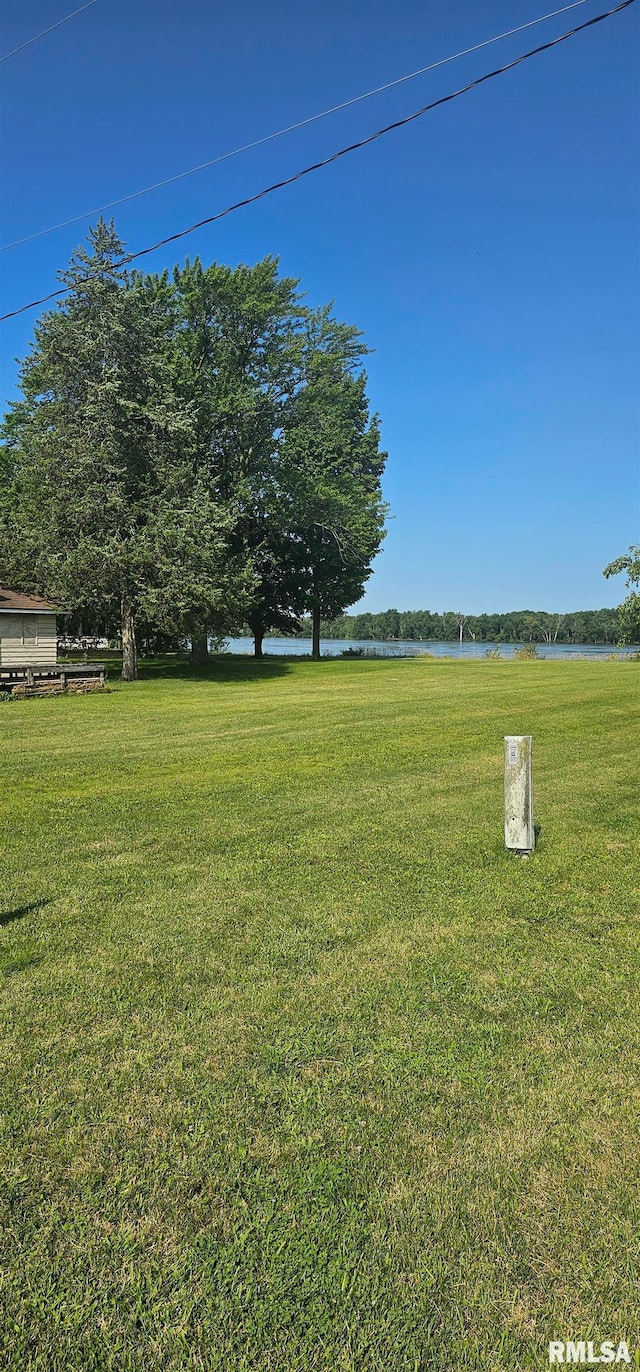 view of yard with a water view