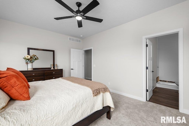 carpeted bedroom with ceiling fan