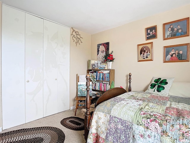 bedroom featuring a closet and carpet floors