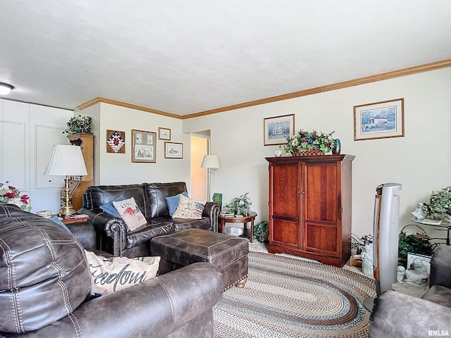 living room featuring ornamental molding and carpet flooring