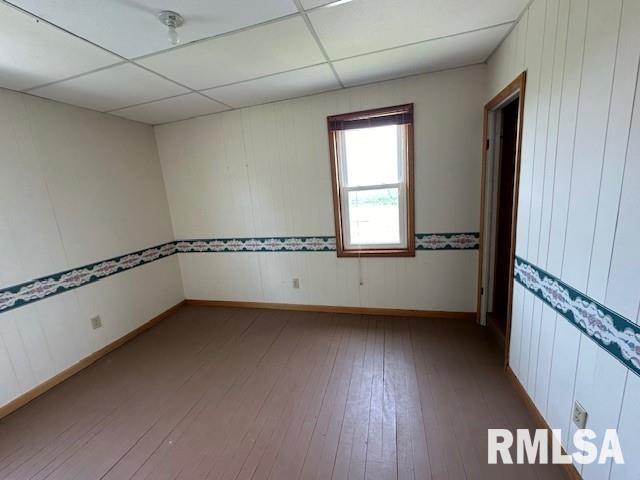 empty room featuring hardwood / wood-style floors