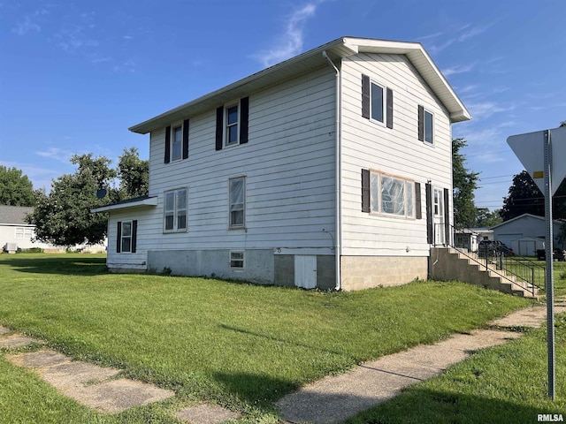 view of property exterior featuring a yard