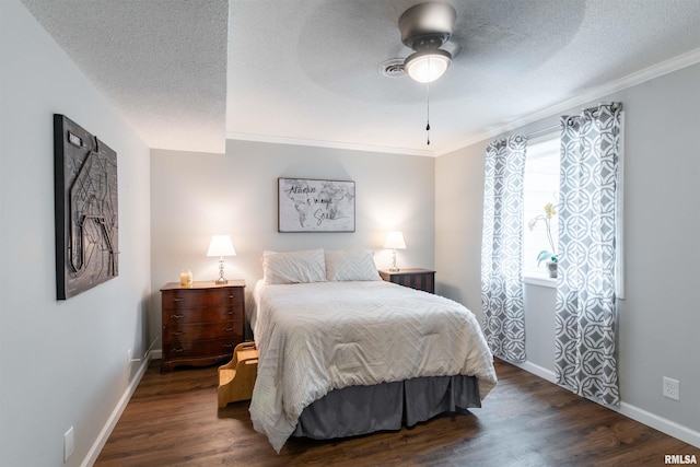 bedroom with crown molding, ceiling fan, a textured ceiling, and dark hardwood / wood-style flooring