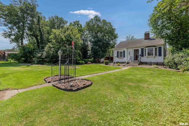 view of front of home with a front lawn