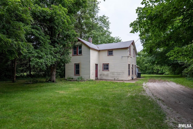 exterior space with a yard