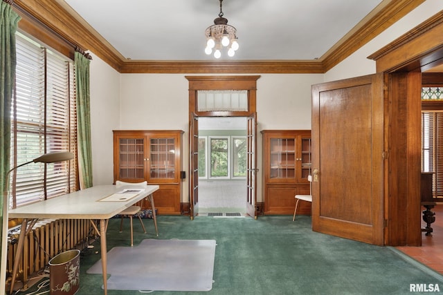 office featuring an inviting chandelier, tile patterned flooring, and ornamental molding