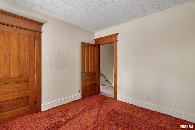 unfurnished bedroom with carpet flooring